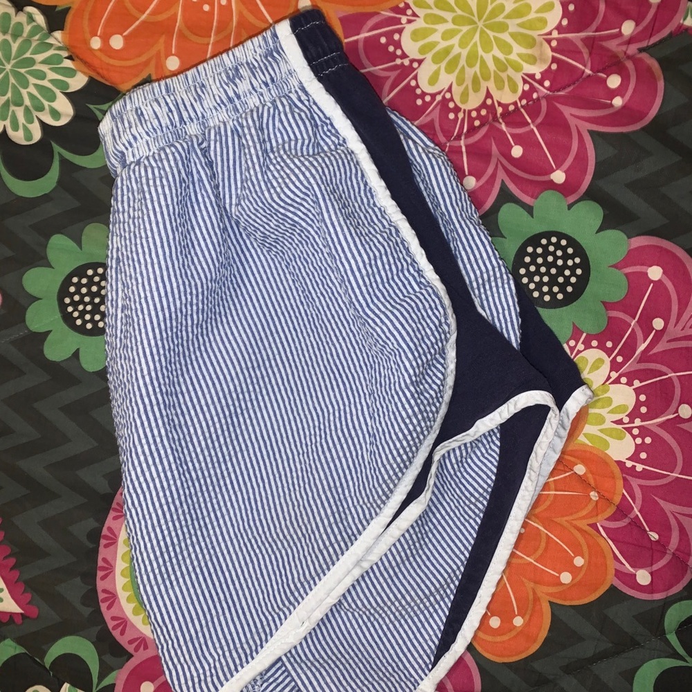 Navy and white seersucker shorts.